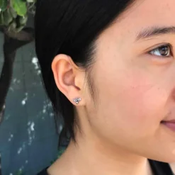 Zilveren oorbellen bijen