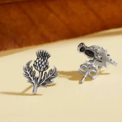 Zilveren oorbellen distel