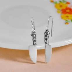 Zilveren oorbellen koksmes