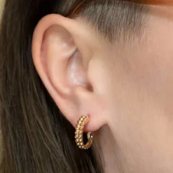 Zilveren oorbellen met bronzen octopusarm