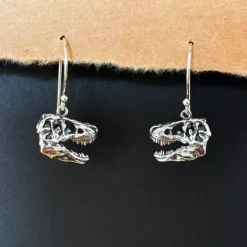 Zilveren oorbellen schedel T-rex