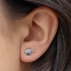 Zilveren oorbellen wol en breinaalden