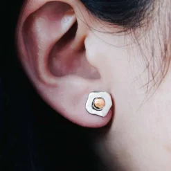 Zilveren/bronzen oorbellen spiegelei